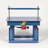 Vibrating Tables and Pokers
